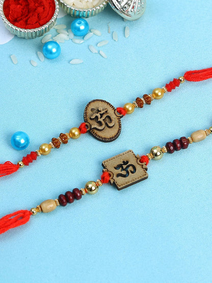 Dhiyona Set Of 2 Red Wooden Om Beaded Rakhi With Roli Rice & Greeting Card