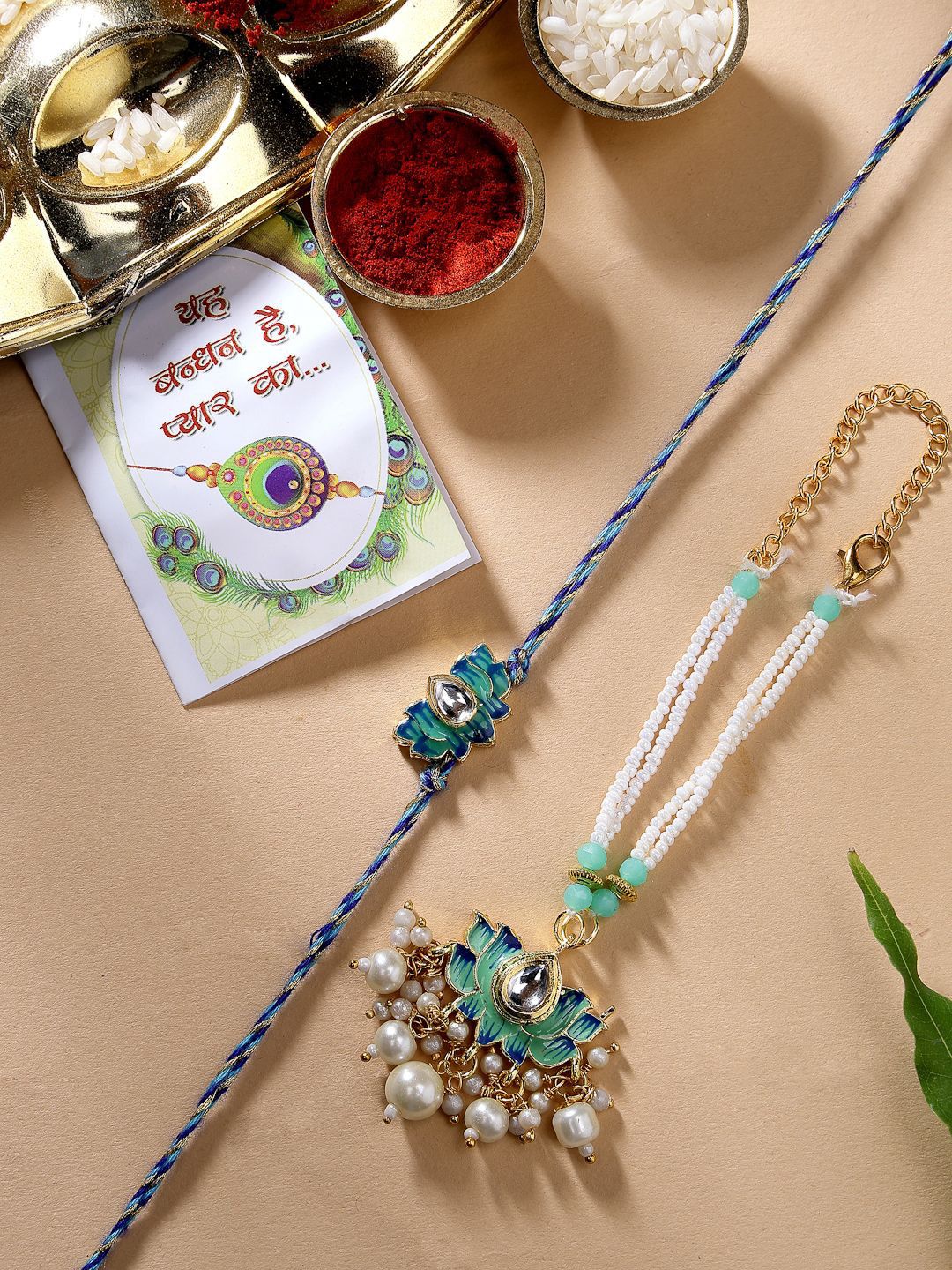Dhiyona Kundan Studded And Beaded Lotus Shape Bhaiya Bhabhi Rakhis With Roli Chawal