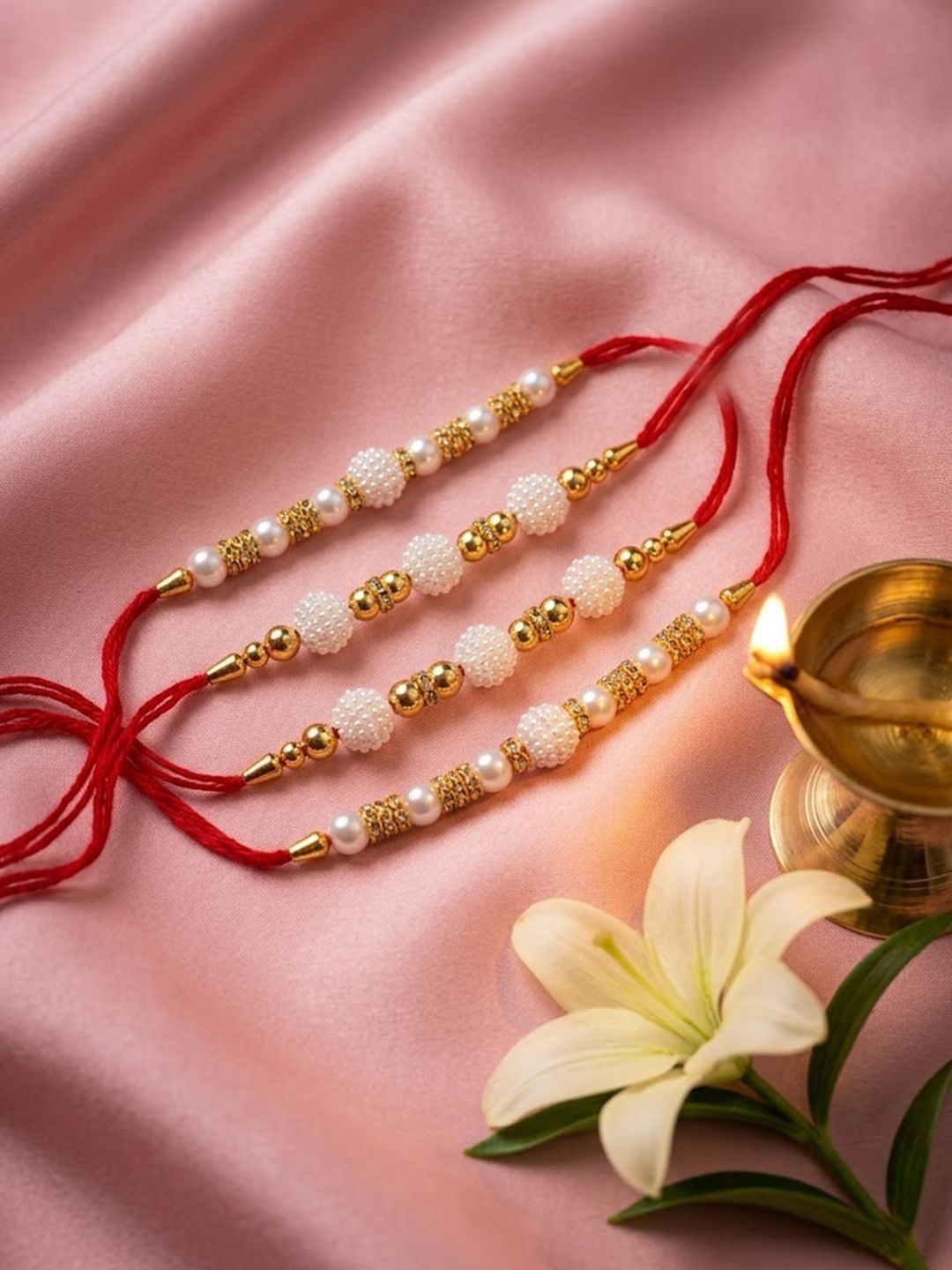 Dhiyona Set Of 4 White Pearls & Red Thread Rakhi With Roli Chawal Chandan Mishri