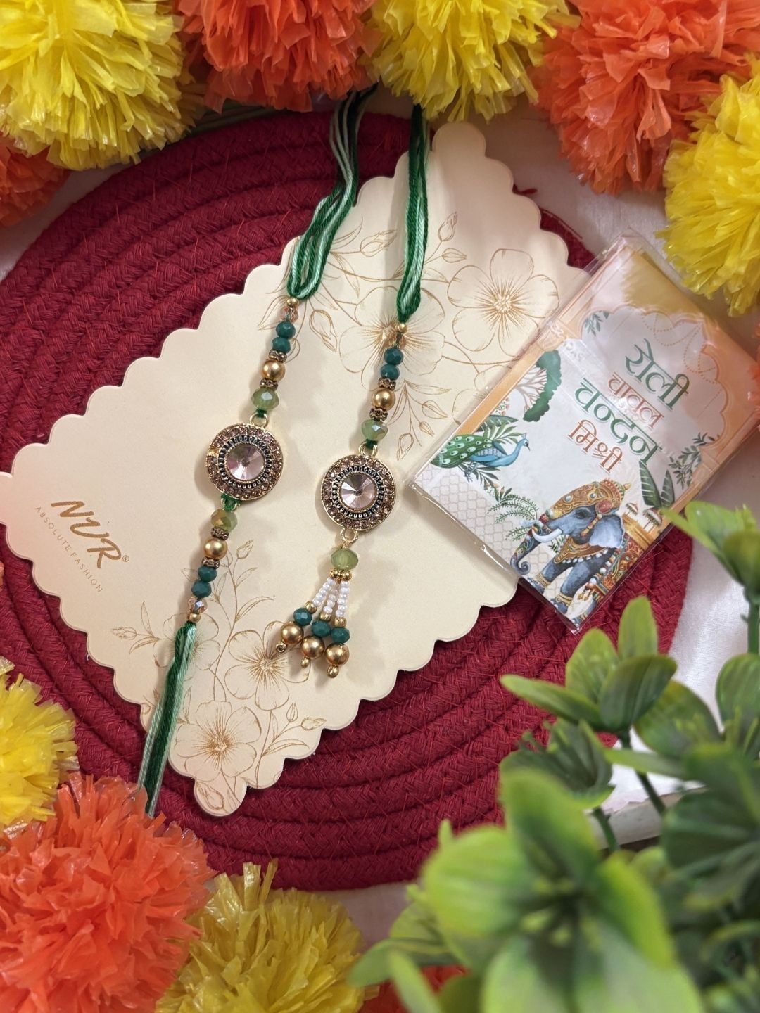 Dhiyona Set Of 2 Ad Drawstring Bhaiya Bhabhi Rakhi With Roli Chawal Chandan Mishri