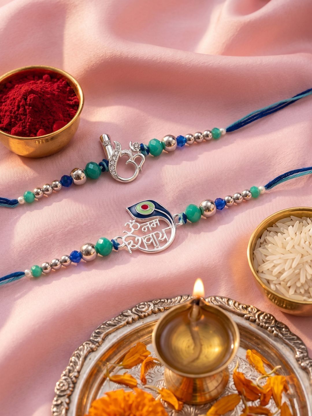 Dhiyona Set Of 2 Silver Toned Beaded Religious Thread Rakhi With Roli Chawal Chandan Mishri