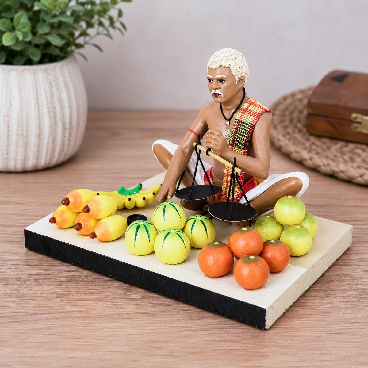 Niharika Collections Krishnanagar Handmade Clay Fruit Seller Idol, Sitting Human Figure Miniature,Hand-Painted Indian Art, Multicolour Home Décor,Golu Display & Gifting-15.2 x 10.2 x 10.2 cm