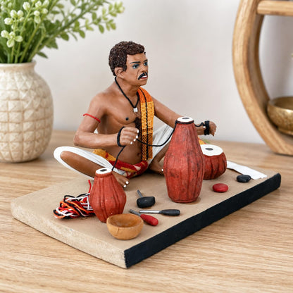 Niharika Krishnanagar Handmade Clay Idol, Musical Instruments Maker Figurine, Hand-Painted Sitting Human Figure Miniature, Indian Art Home Décor Gift for Tabletop, Shelf & Showcase, 18 x 15 x 12 cm