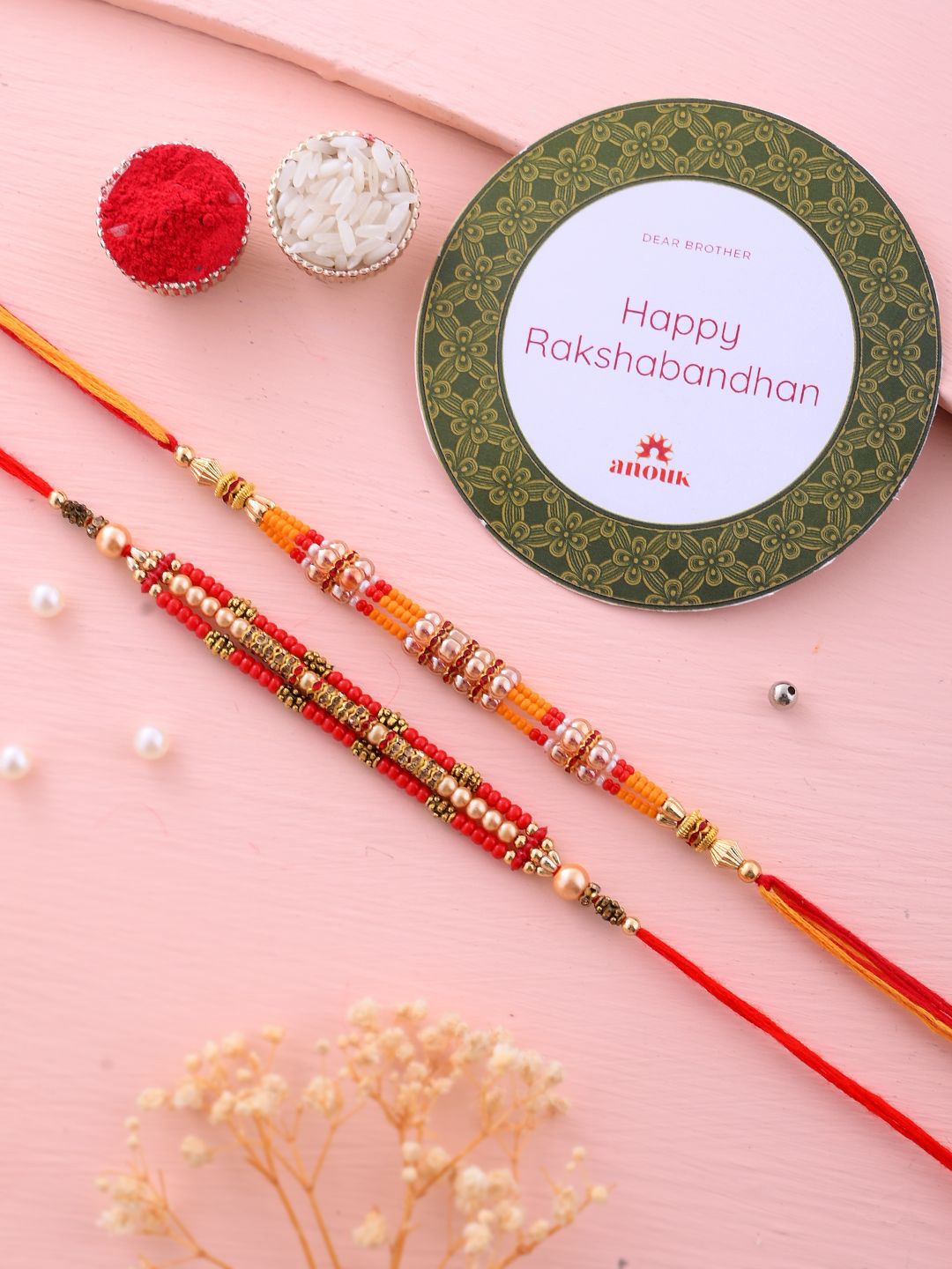 Dhiyona Set Of 2 Red Beaded Rakhi With Roli Rice & Greeting Card