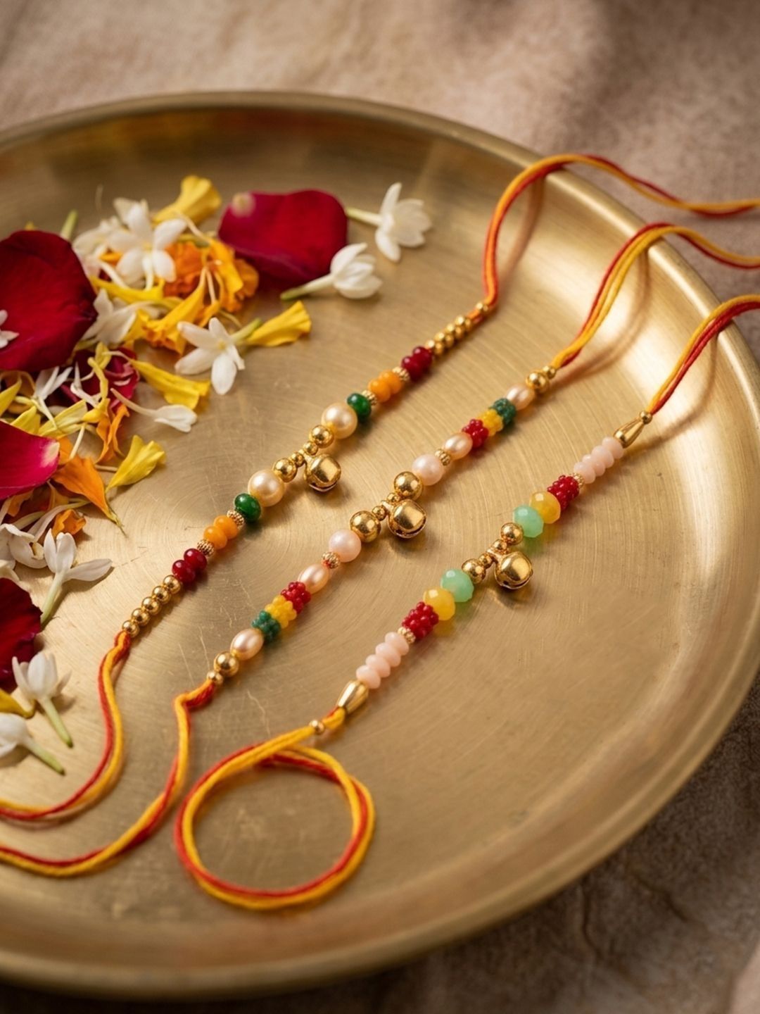 Dhiyona Set Of 3 Artificial Beads Orange Thread Rakhi With Roli Chawal Chandan Mishri