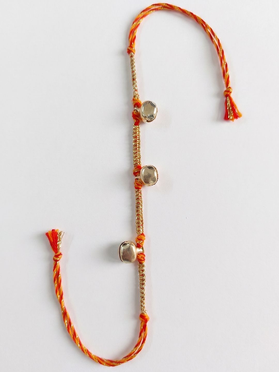 Dhiyona Golden Ghungroo Thread Rakhi With Roli Chawal Chandan Mishri