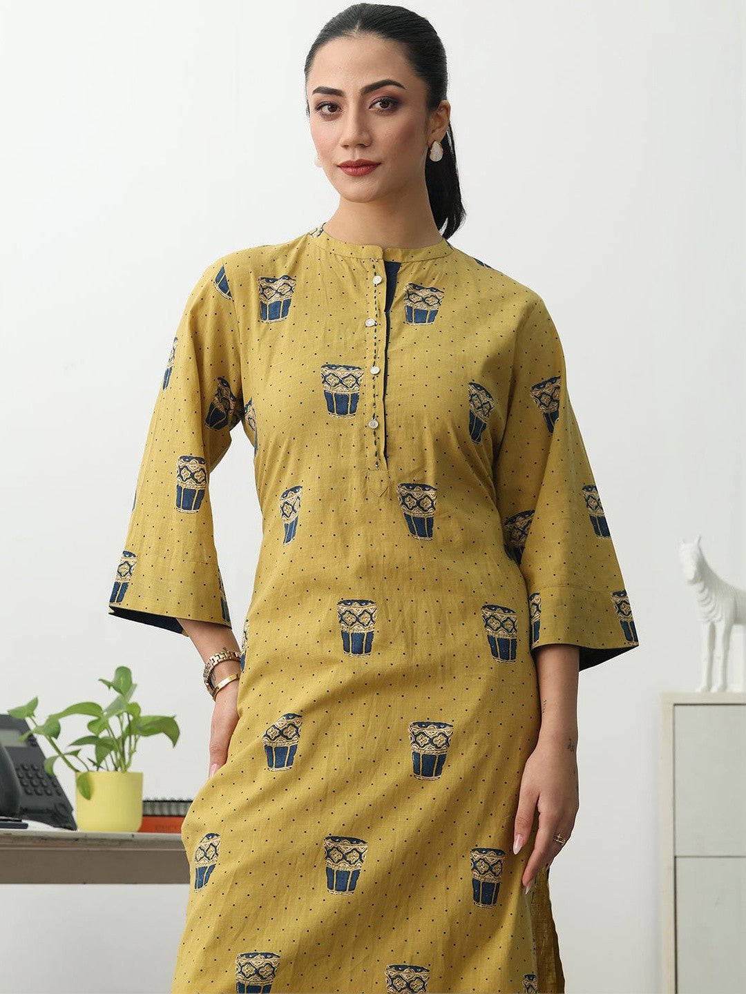 Women Ethnic Motifs Printed Regular Cotton Blend Kurta with Trousers
