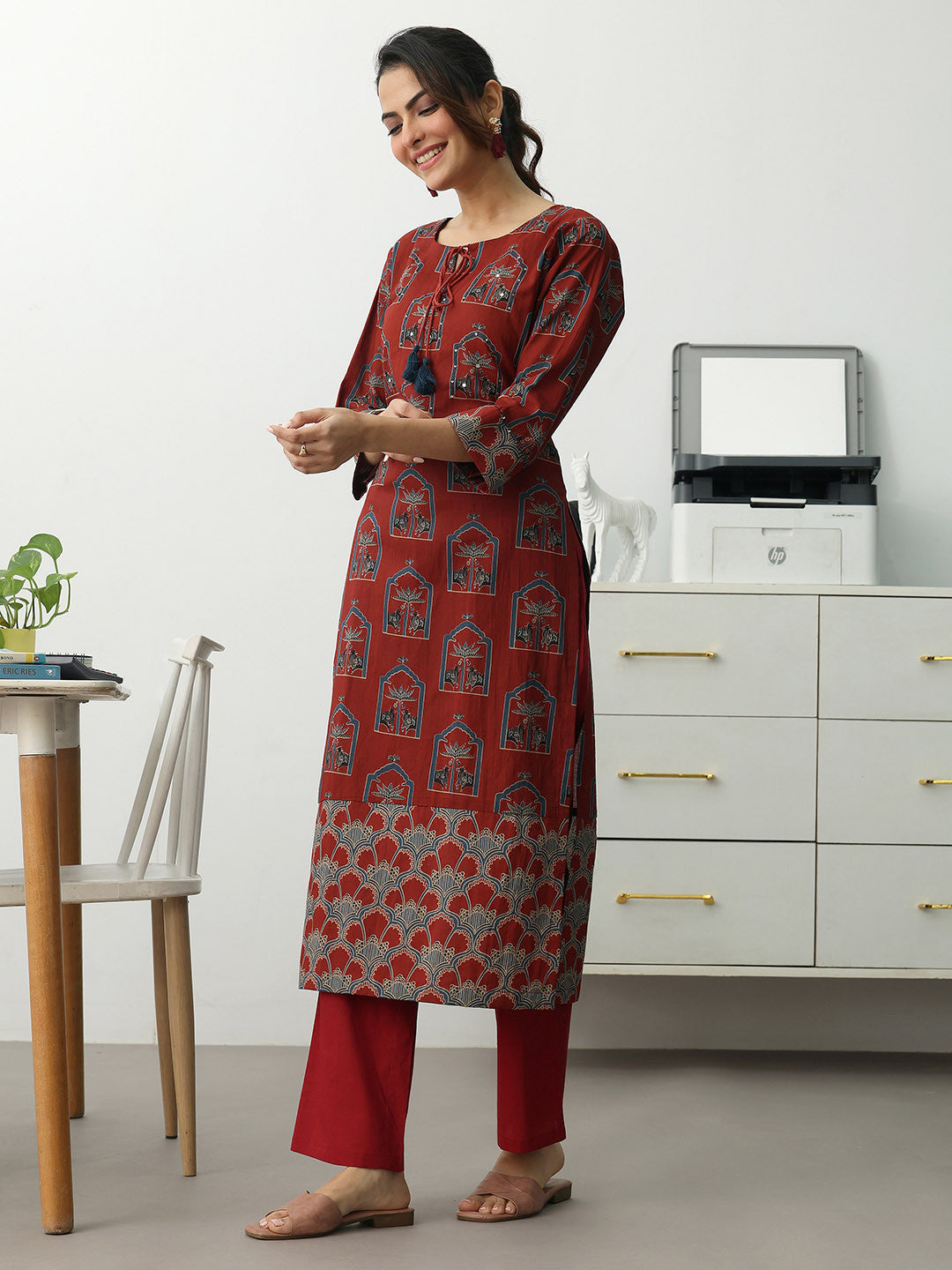 Women Ethnic Motifs Printed Regular Cotton Blend Kurta with Trousers