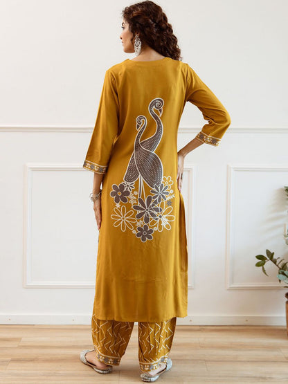 Women Embroidered Regular Beads and Stones Kurta with Trousers