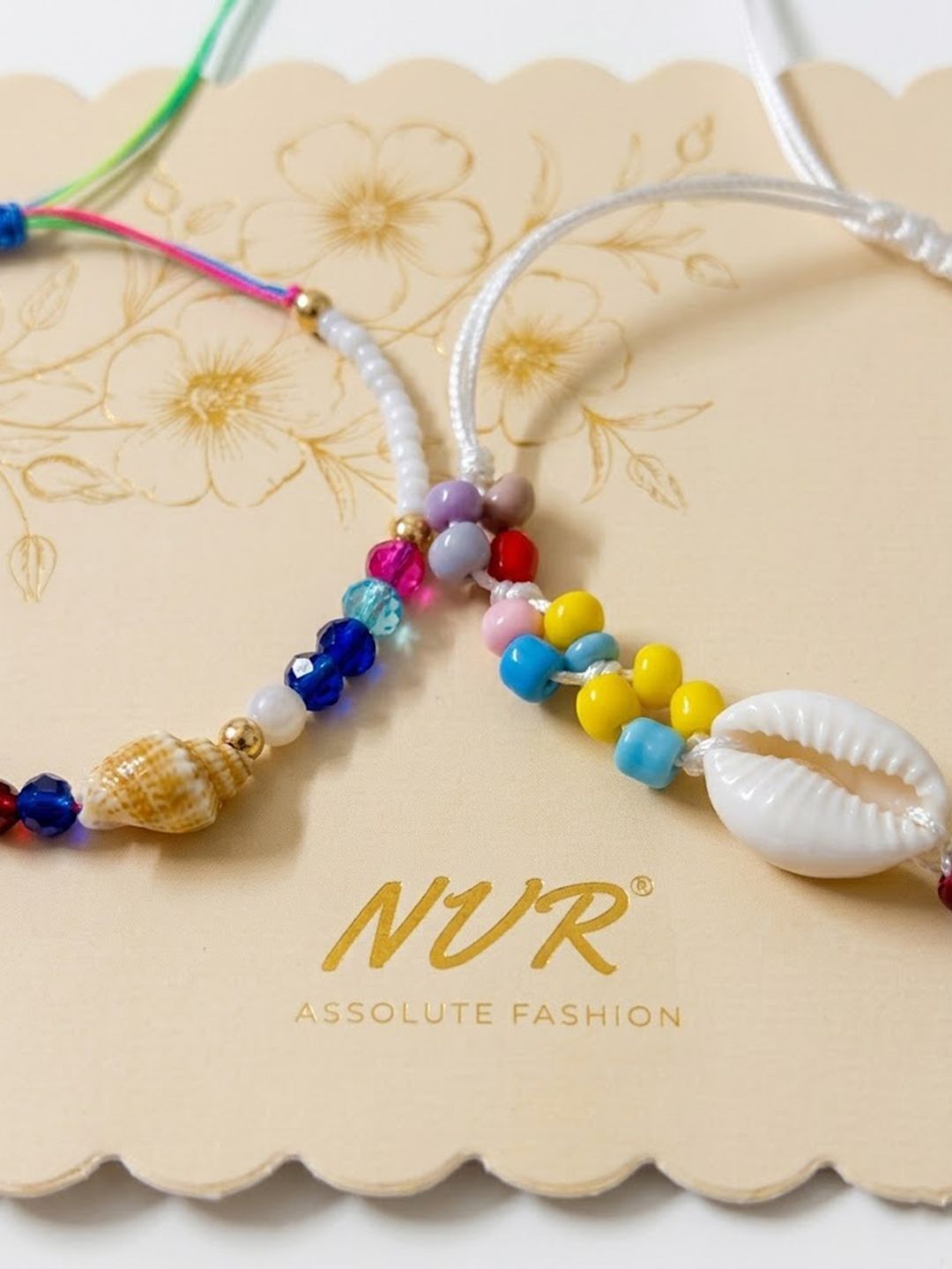 Dhiyona Set Of 2 Artificial Beads Thread Rakhi With Roli Chawal Chandan Mishri