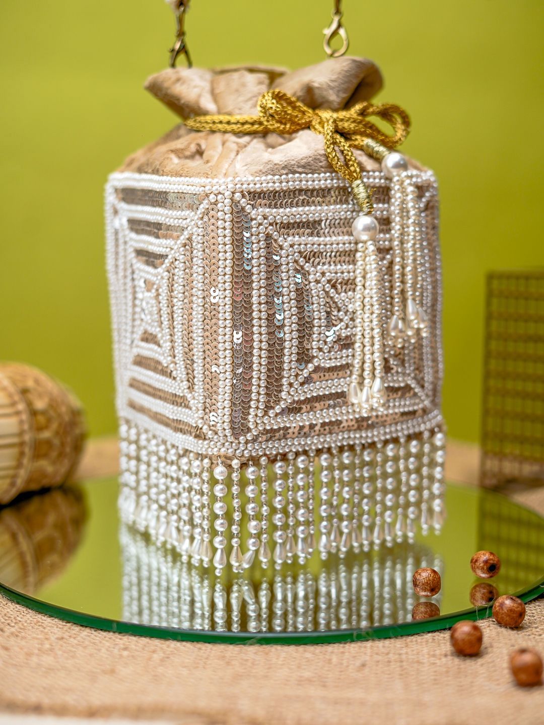 Dhiyona NR Embroidered Pearl Potli Clutch
