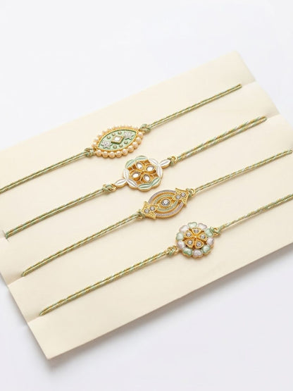 Dhiyona Set Of 4 White Artificial Stones & Green Thread Rakhi