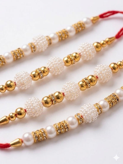 Dhiyona Set Of 4 White Pearls & Red Thread Rakhi With Roli Chawal Chandan Mishri