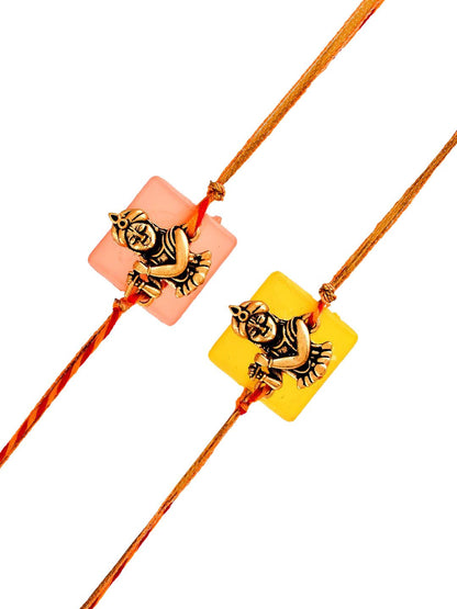 Dhiyona Set Of 2 Red Kanhaiya Rakhis With Roli Chawal & Greeting Card