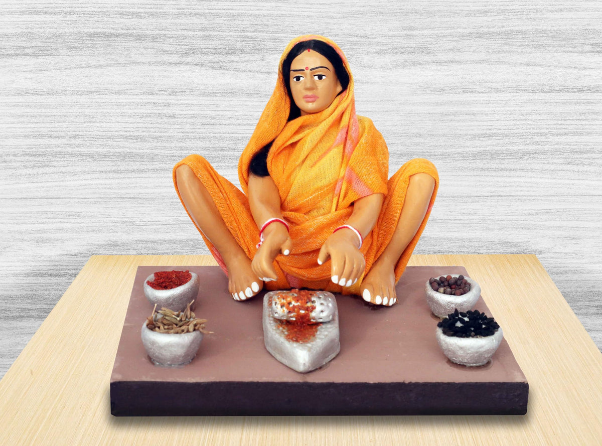 Niharika Collections Krishnanagar Handmade Clay Gift & Décor | Basic- Sitting Human Figure Miniature Idol - Spice-Grinding Woman, 12 x 10 Cm, Multicolour