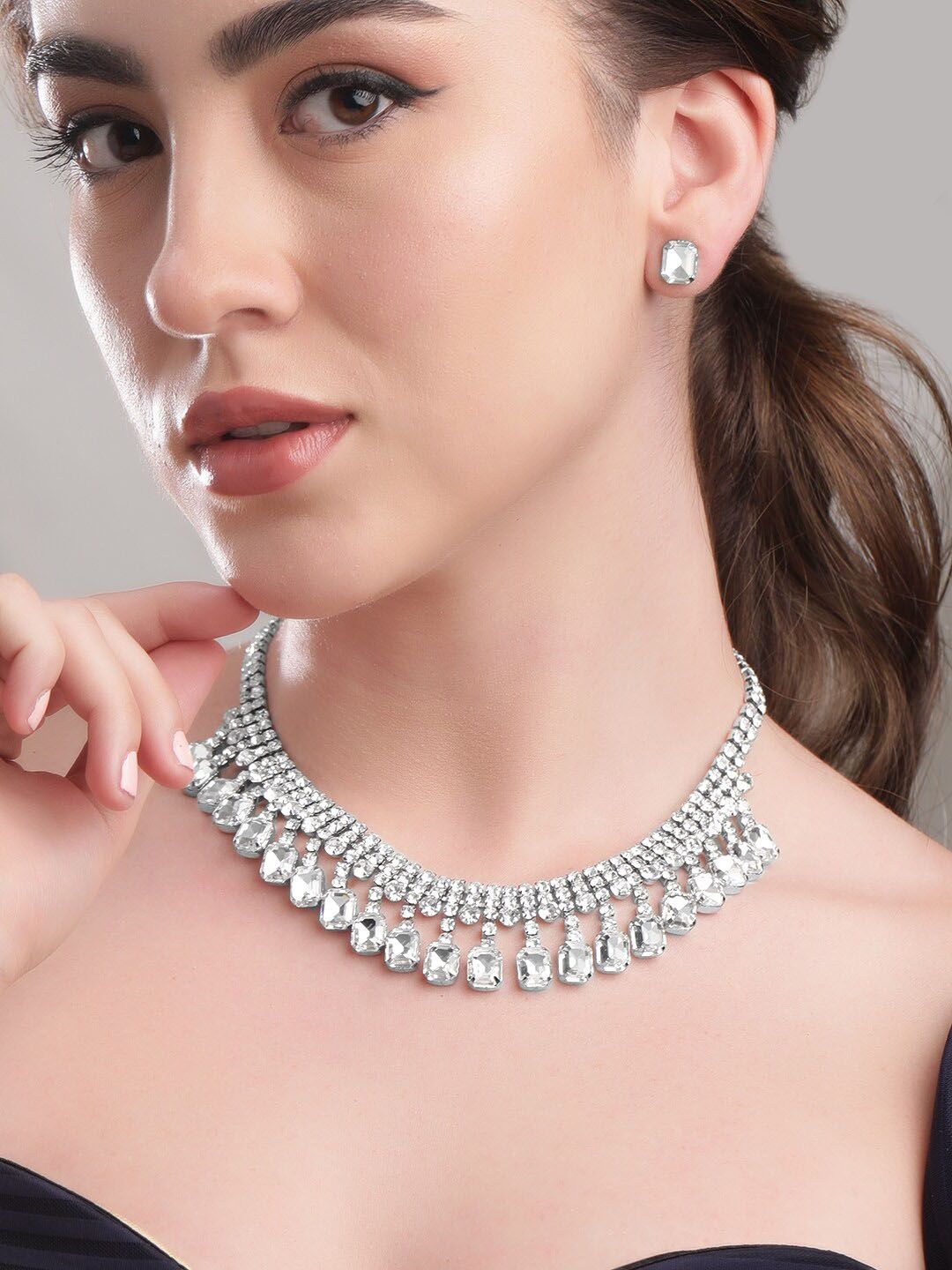 Dhiyona RJ Women's Women Rhodium Plated Crystal White AD & Cubic Zirconia Studded Jewellery Set