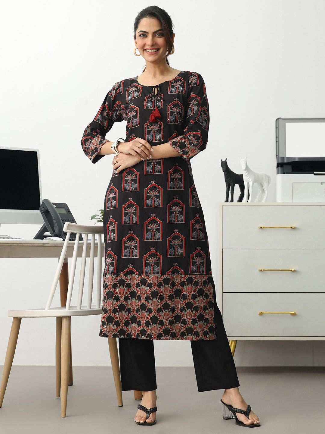 Women Ethnic Motifs Printed Regular Cotton Blend Kurta with Trousers