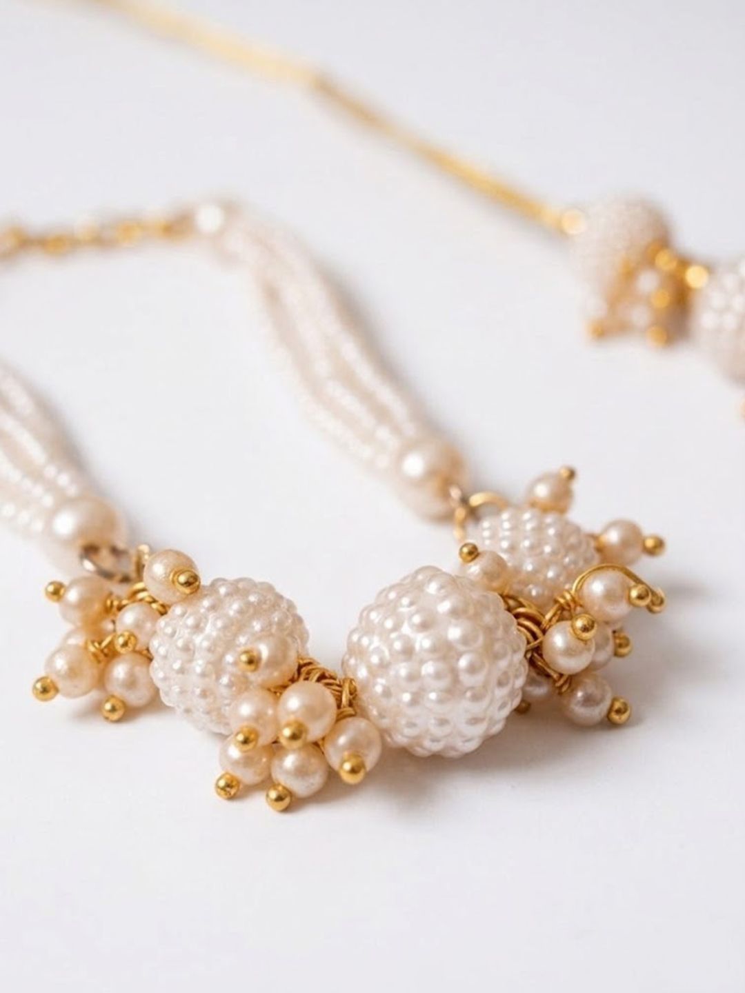 Dhiyona Set Of 2 Gold Toned & White Pearls Bhaiya Bhabhi Rakhi