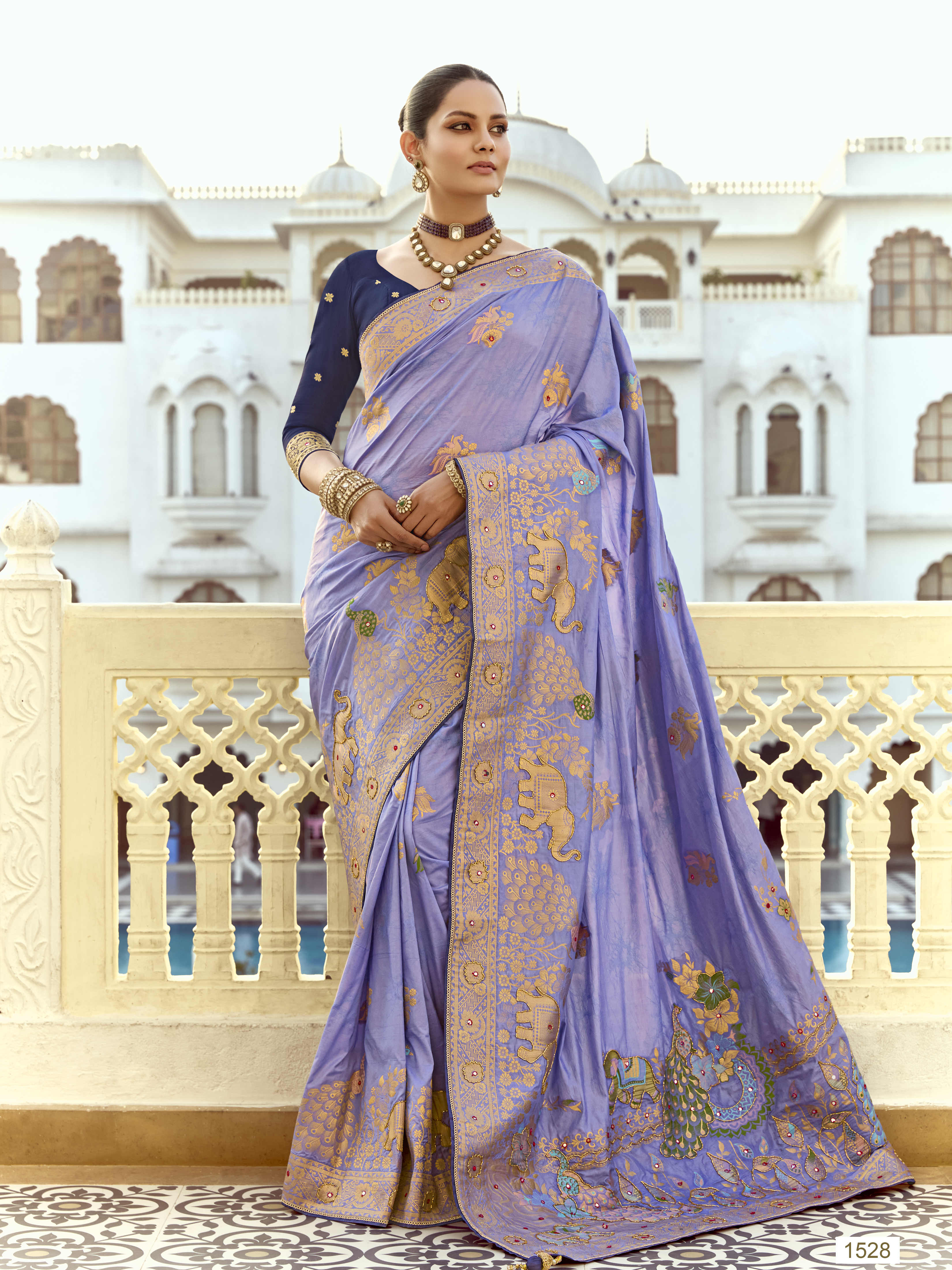 Dhiyona KM Women Lavender Banarasi Silk Saree With Blue Contrast Blouse