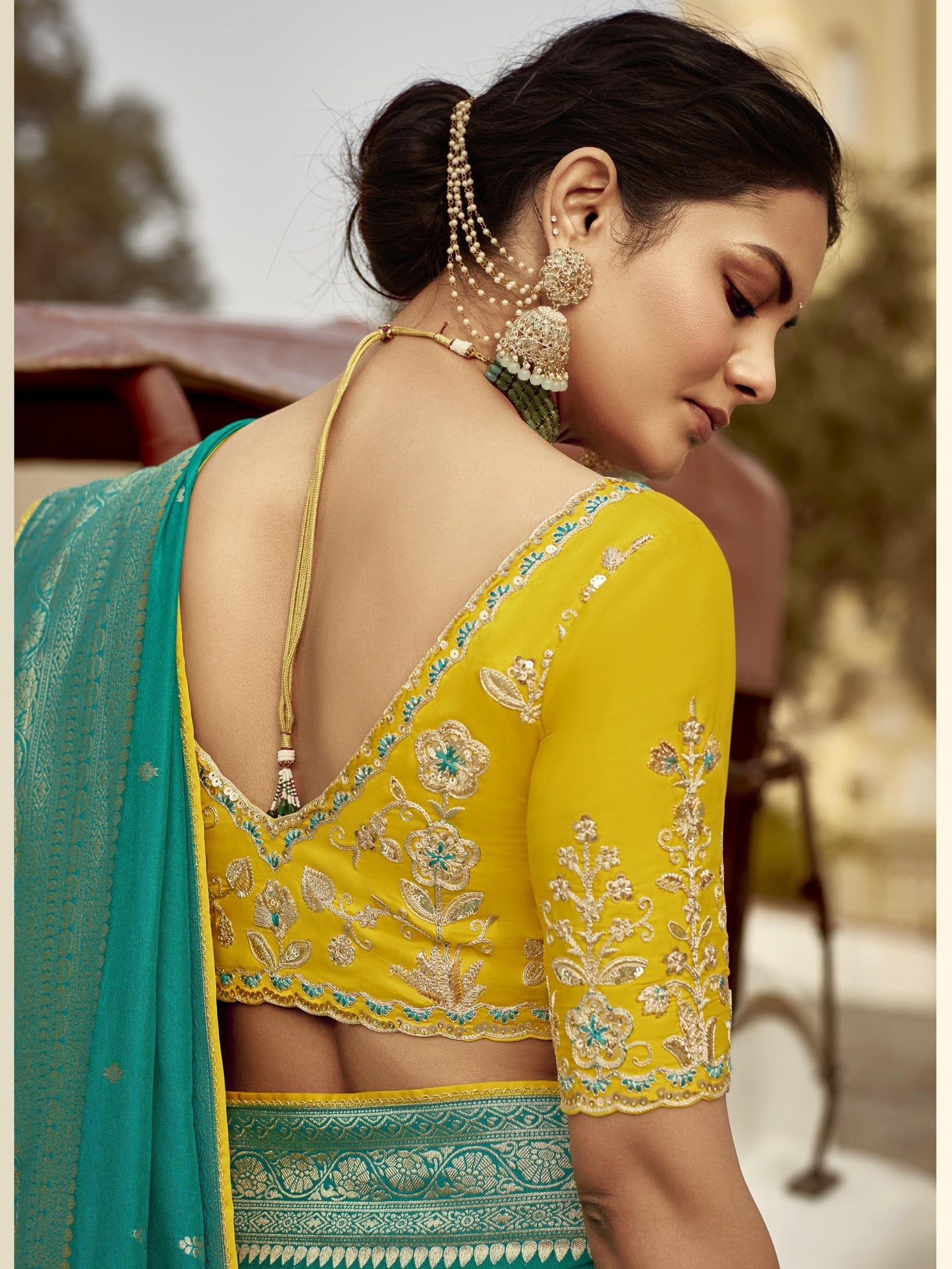 Dhiyona KM Women Graceful Green Silk Saree “ A Heritage Statement