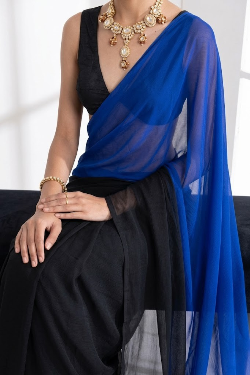 Dhiyona ST Black and Blue Georgette Triangle Saree with Blouse Fabric
