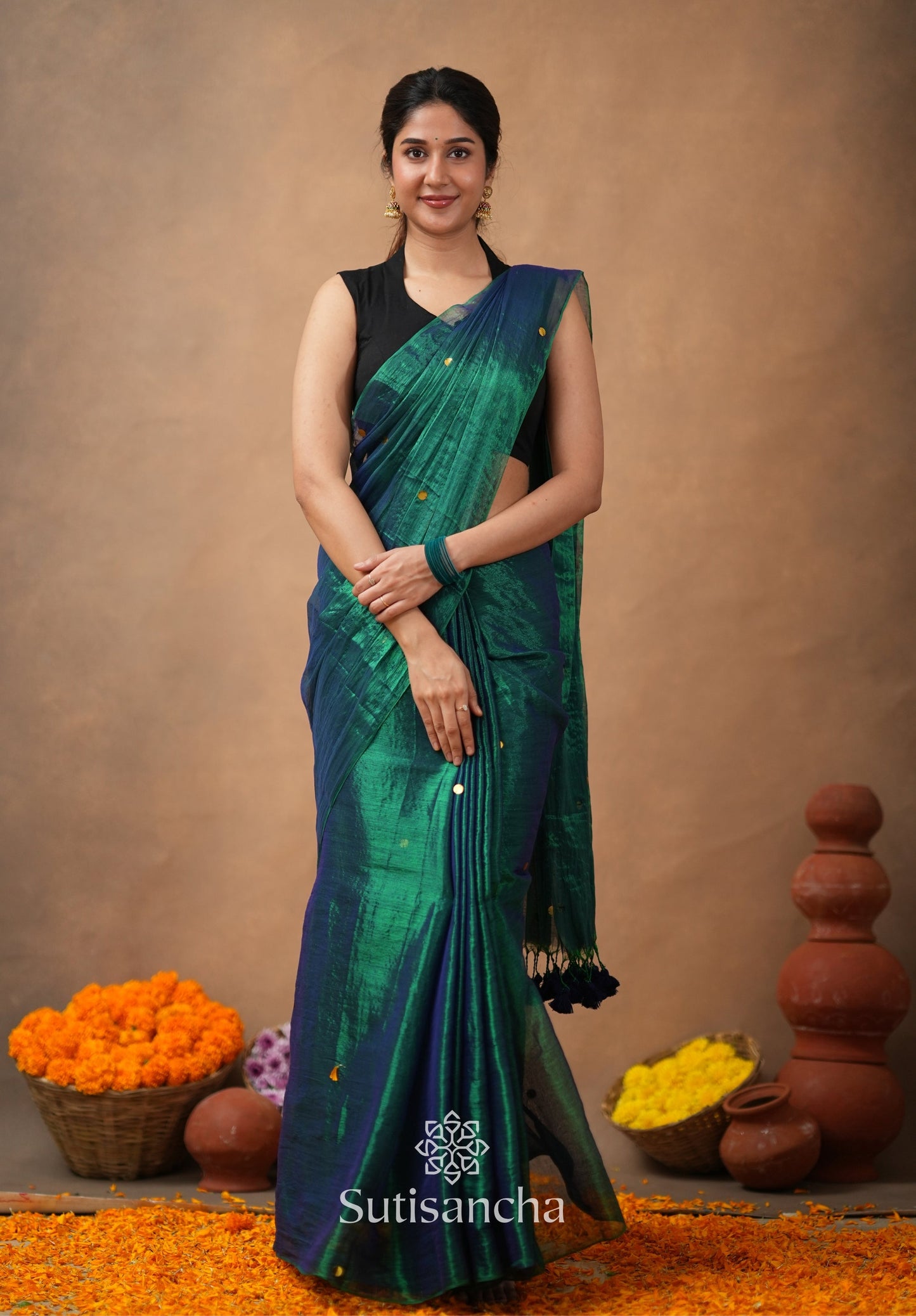 Dhiyona SS Premium Tissue Saree Accented with Siquin Shine