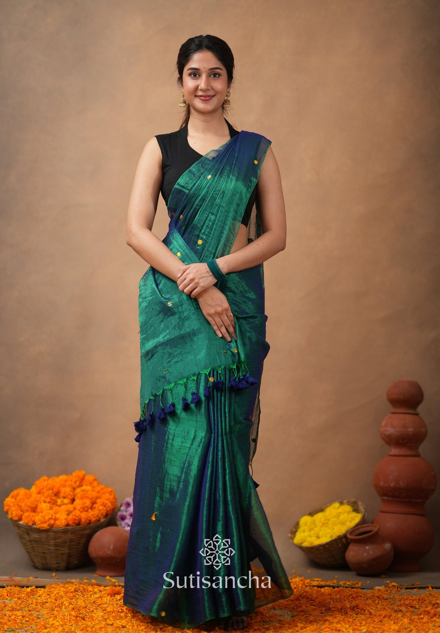 Dhiyona SS Premium Tissue Saree Accented with Siquin Shine