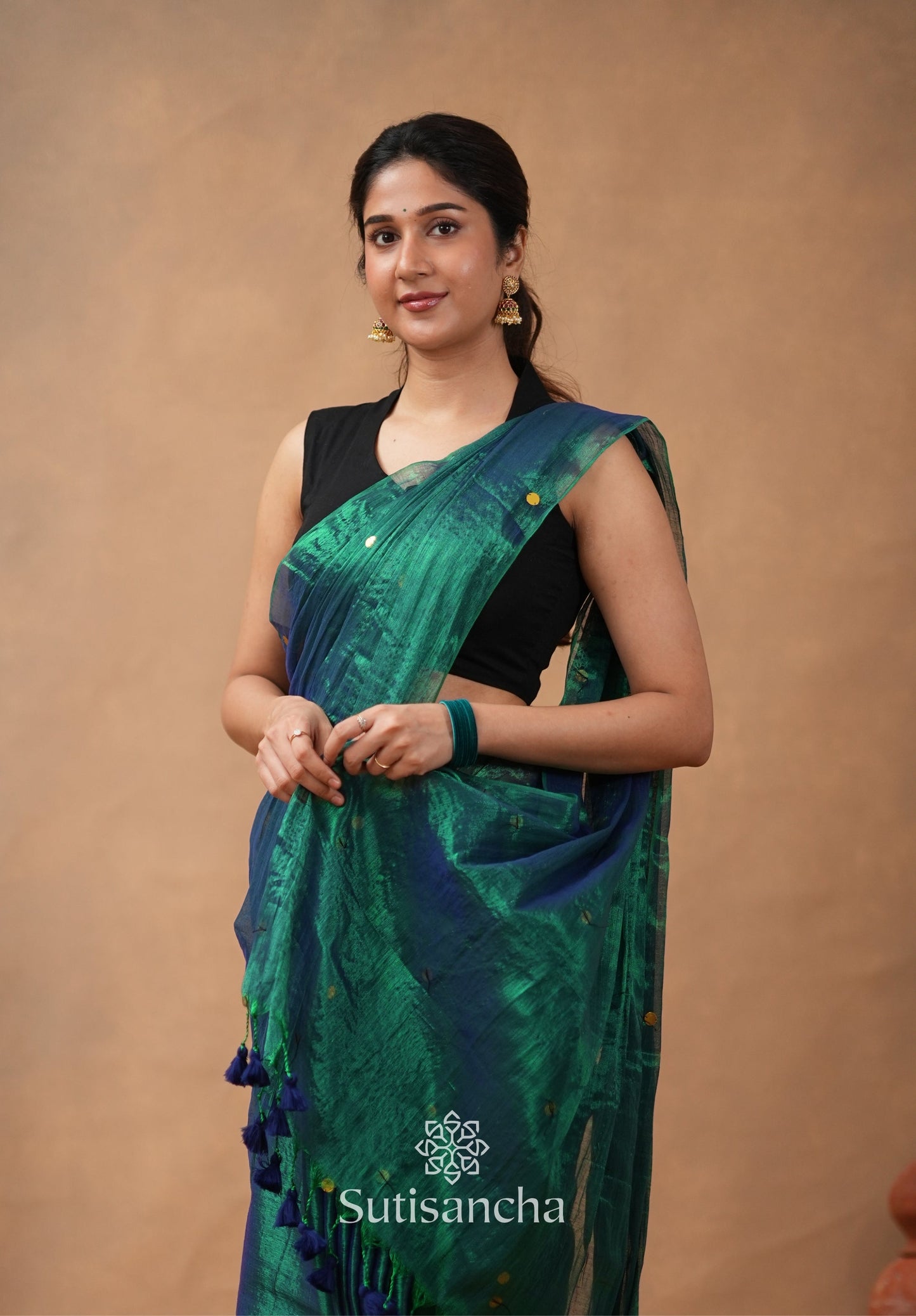 Dhiyona SS Premium Tissue Saree Accented with Siquin Shine