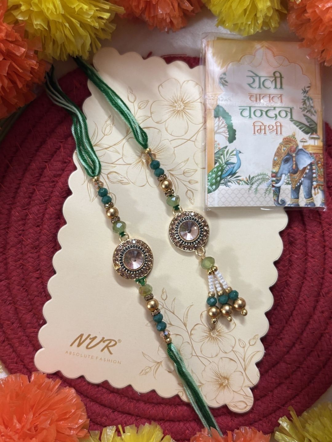 Dhiyona Set Of 2 Ad Drawstring Bhaiya Bhabhi Rakhi With Roli Chawal Chandan Mishri