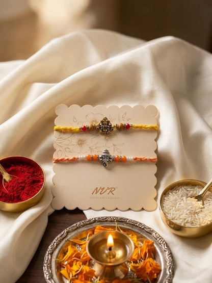 Dhiyona Set Of 2 Multicolor Religious Thread Rakhi With Roli Chawal Chandan Mishri