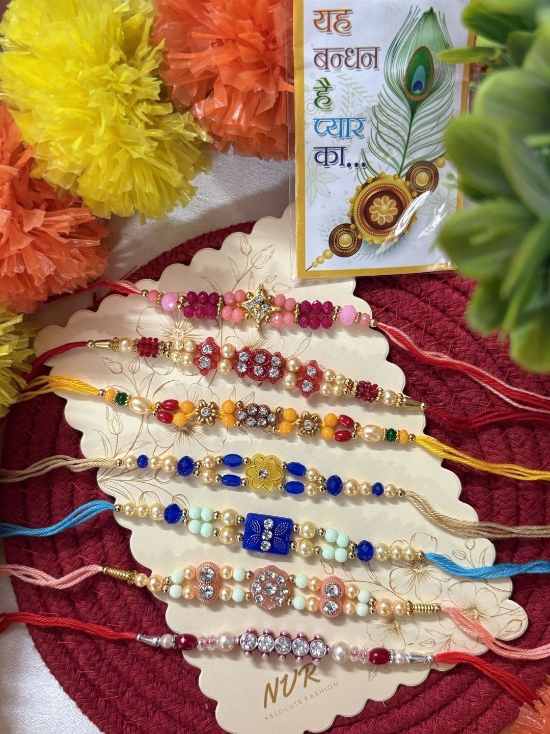 Dhiyona Set Of 7 Multicolor Designer Thread Rakhi With Roli Chawal Chandan Mishri