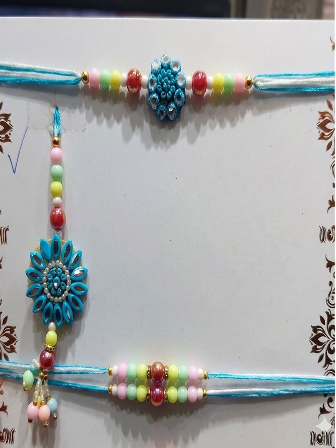 Dhiyona Set Of 4 Family Pack Beaded Thread Rakhi With Roli Chawal Chandan Mishri