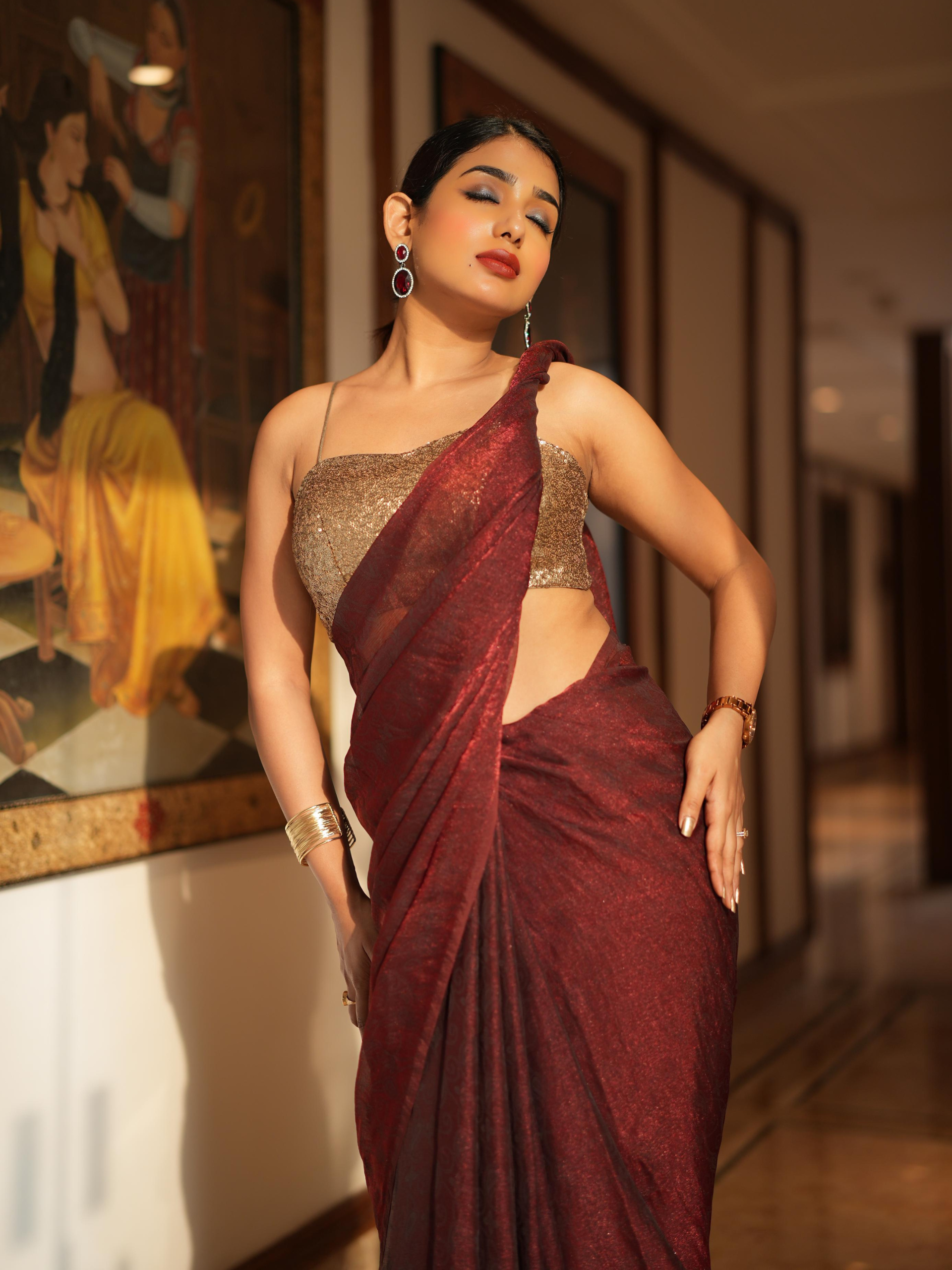 Dhiyona ST Majestic Maroon Paisley Chiffon Saree with Bronze Long Pendants with Blouse Fabric