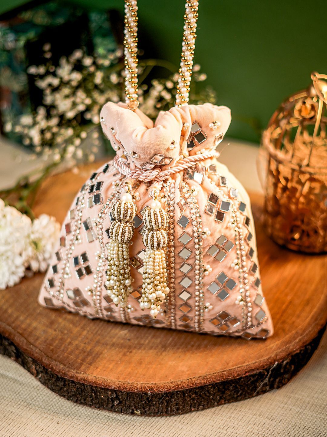 Dhiyona NR Embellished Potli Clutch