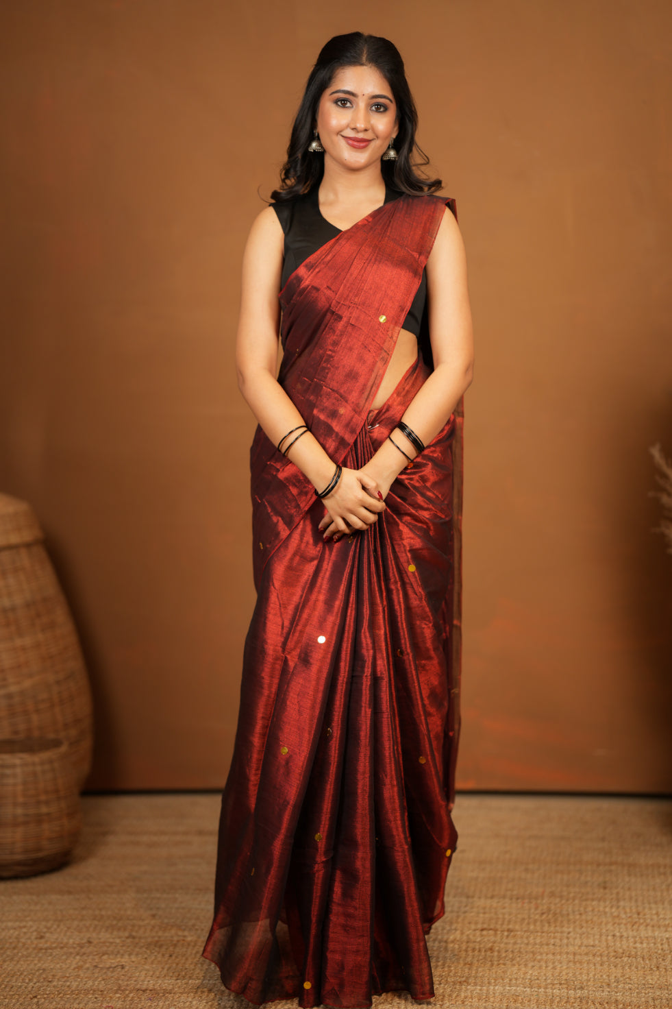 Dhiyona SS Premium Tissue Saree Accented with Siquin Shine