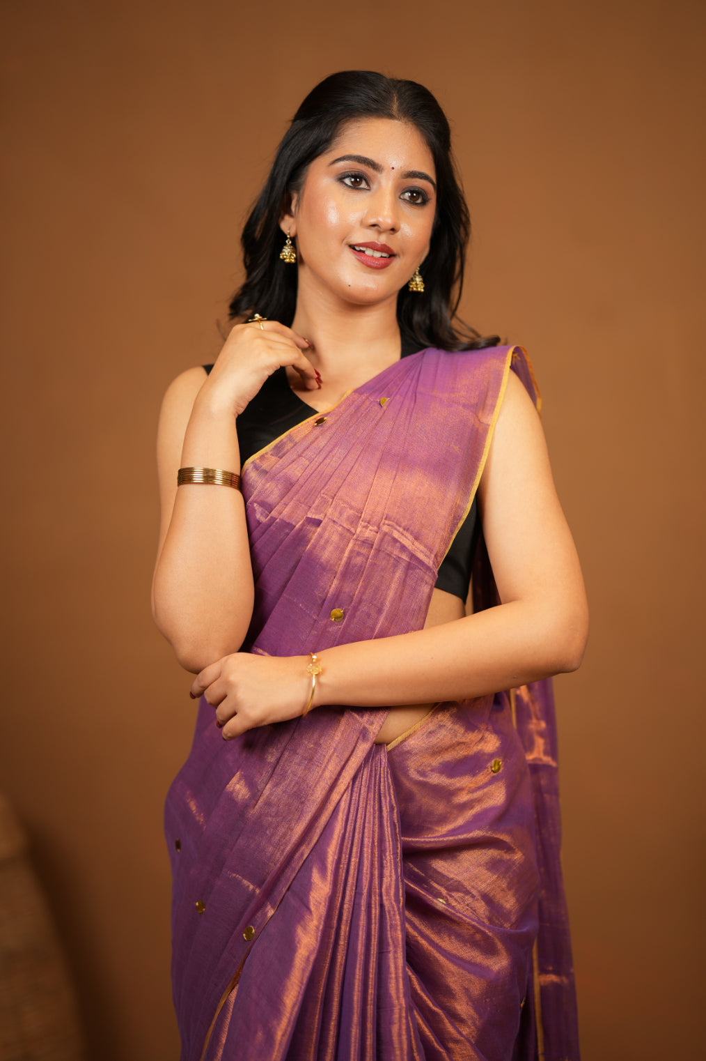 Dhiyona SS Premium Tissue Saree Accented with Siquin Shine