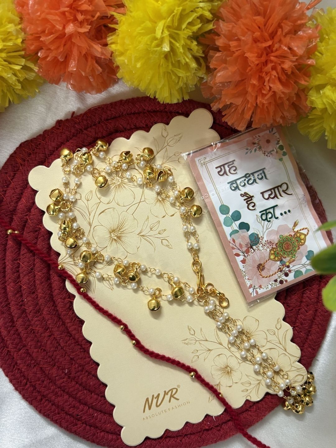 Dhiyona Set Of 2 Pearls Gold Toned Bhaiya Bhabhi Rakhi With Roli Chawal Chandan Mishri