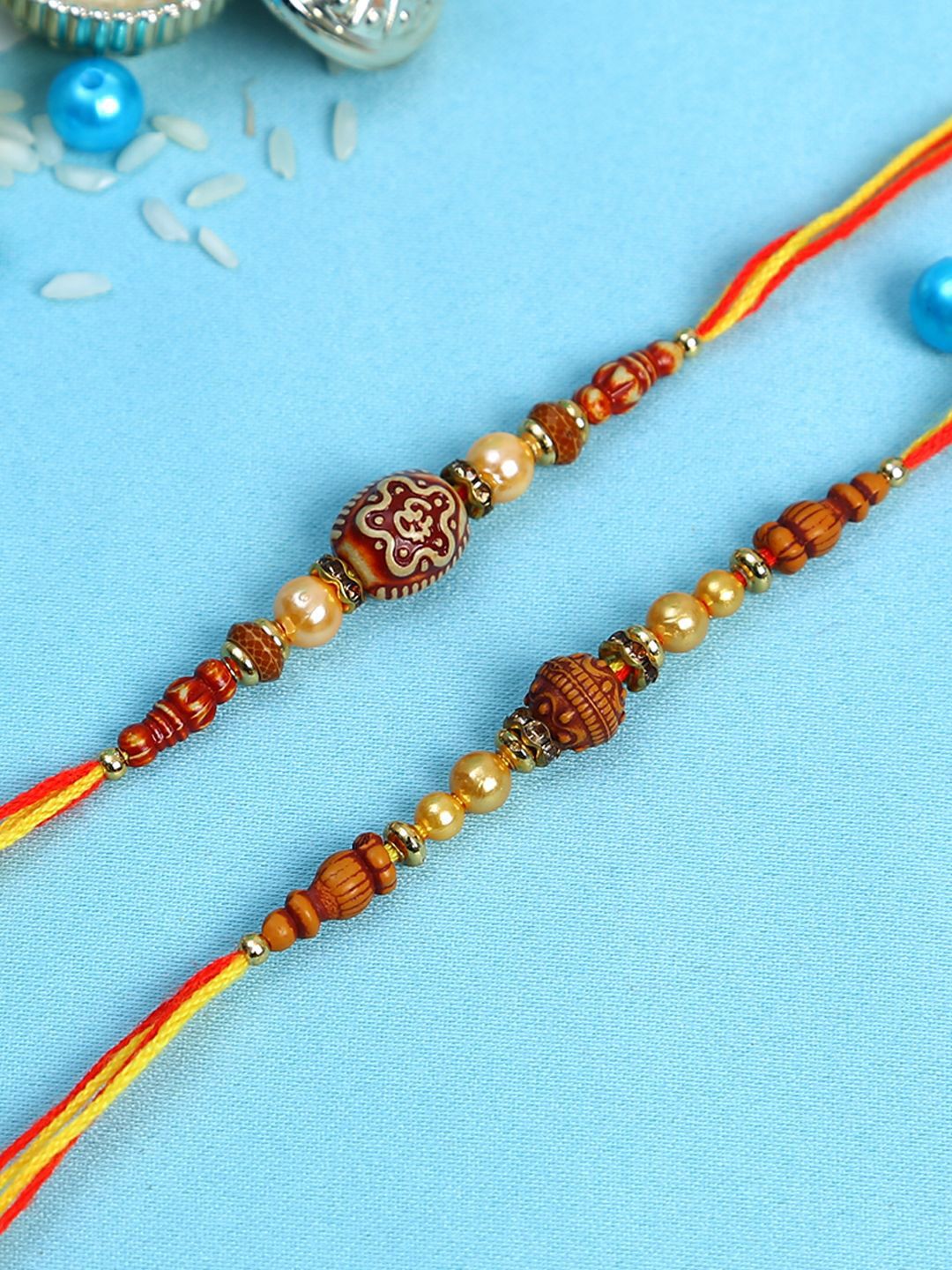 Dhiyona Set Of 2 Brown Beaded Rakhi With Roli Rice & Greeting Card
