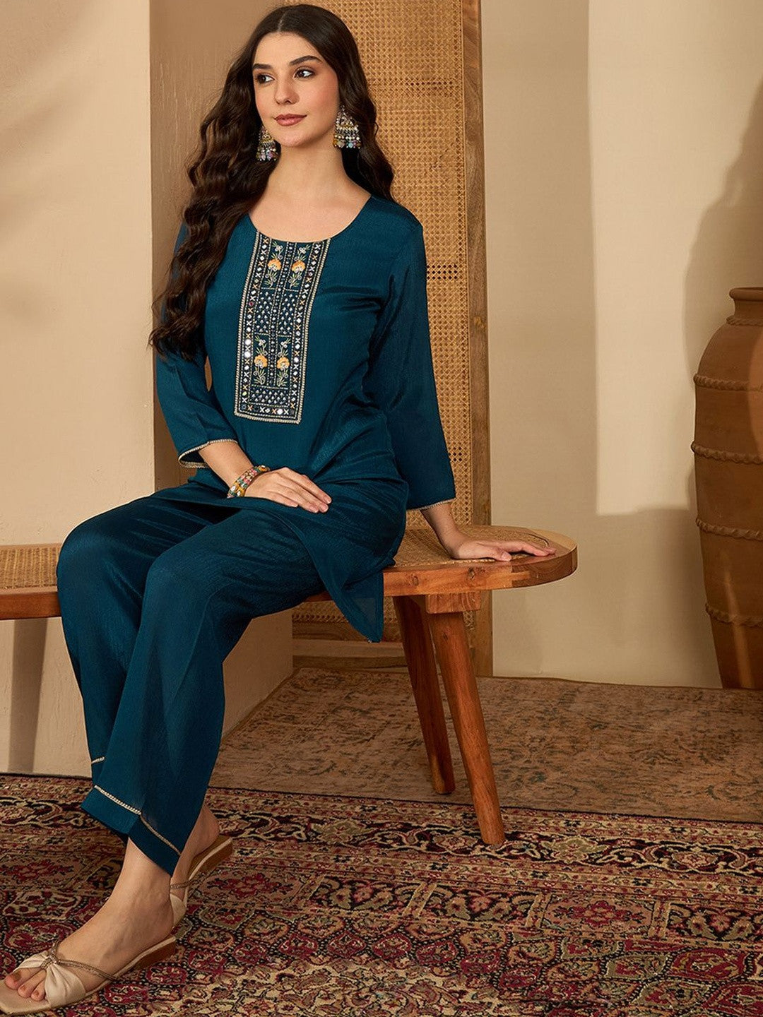 Women Ethnic Motifs Embroidered Asymmetric Sequinned Kurti with Palazzos