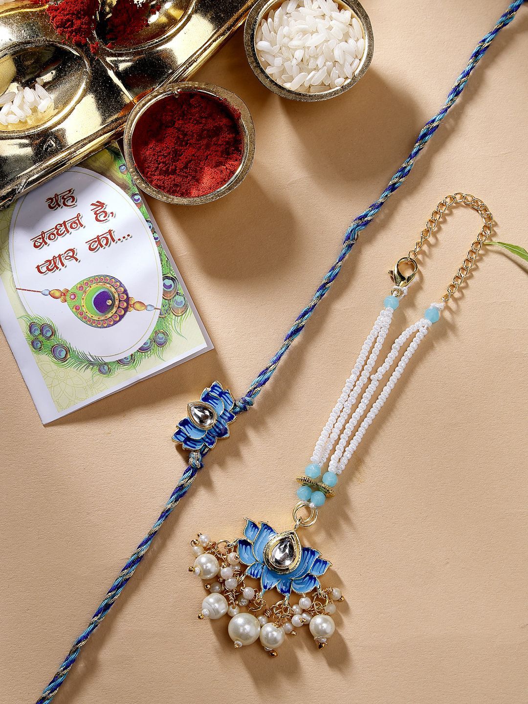 Dhiyona Unisex Set Of 2 Blue Lotus Shape Kundan-Studded & Beaded Wraparound Rakhi Set