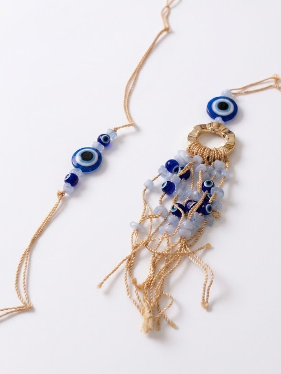 Dhiyona Set Of 2 Gold Toned Round Evil Eye Bhaiya Bhabhi Rakhi