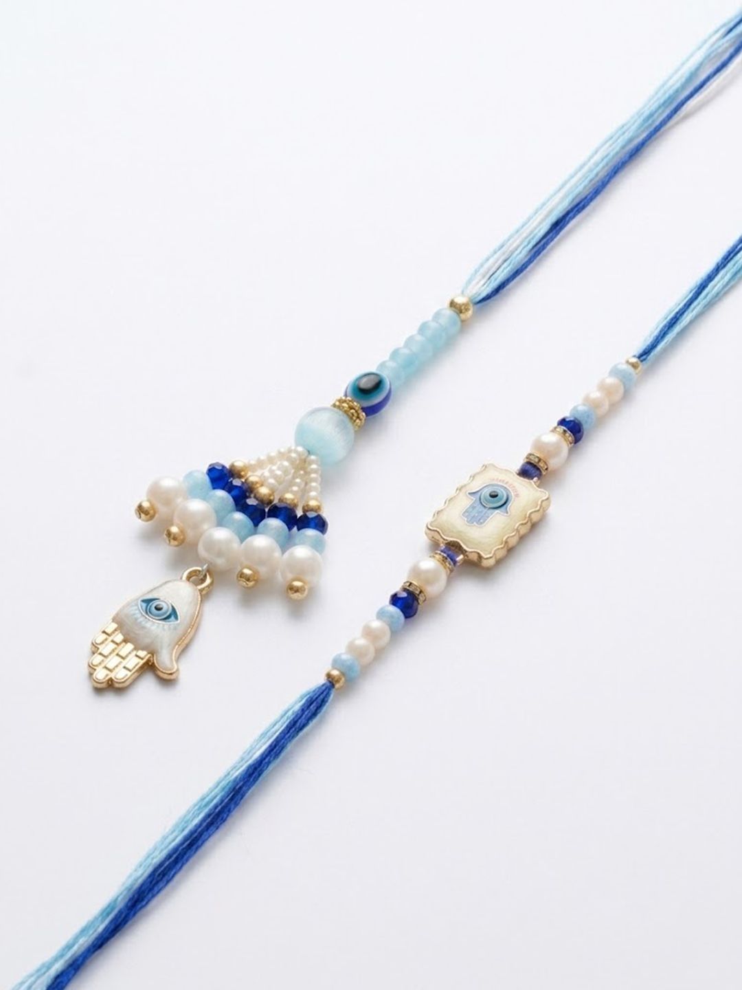 Dhiyona Set Of 2 Evil Eye Hand Design Bhaiya Bhabhi Rakhi With Roli Chawal Chandan Mishri