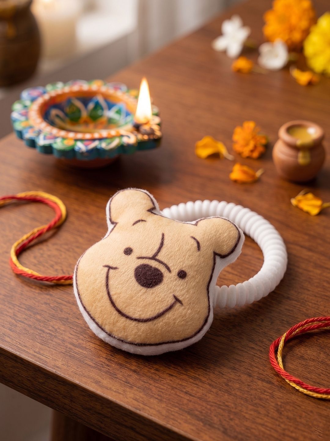Dhiyona Kids Pooh Character Artificial Beads Rakhi With Roli Chawal Chandan Mishri