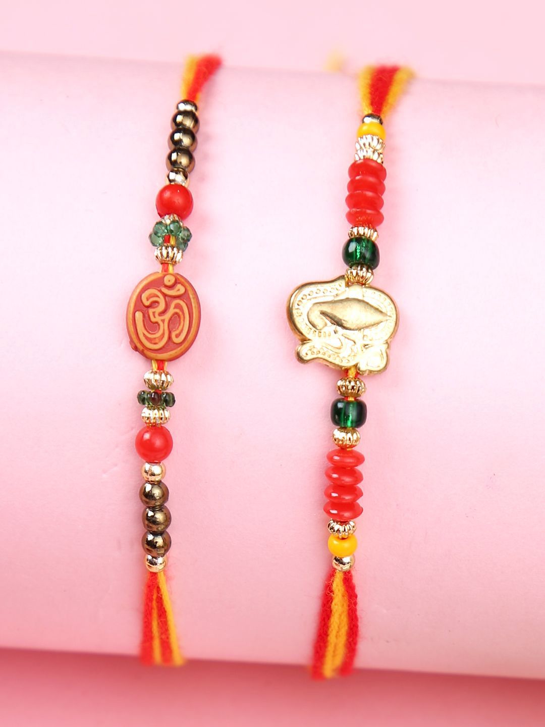 Dhiyona Set Of 2 Red Om & Lord Ganesh Beaded Rakhi With Roli Rice & Greeting Card