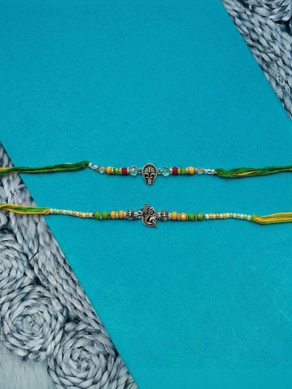Dhiyona Set Of 2 Multicolor Religious Thread Rakhi With Roli Chawal Chandan Mishri