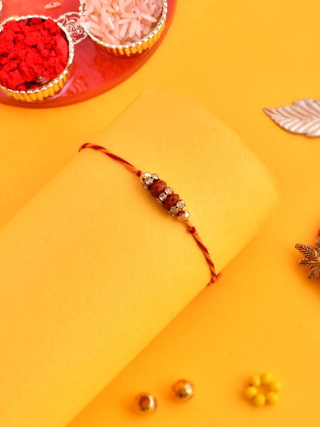 Dhiyona Gold-Toned Beaded Rakhi With Roli Chawal & Greeting Card