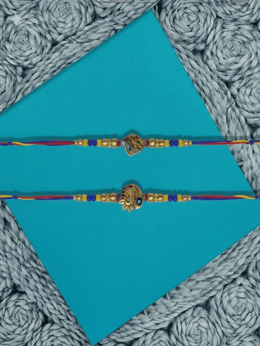 Dhiyona Set Of 2 Peacock Design Thread Rakhi With Roli Chawal Chandan Mishri