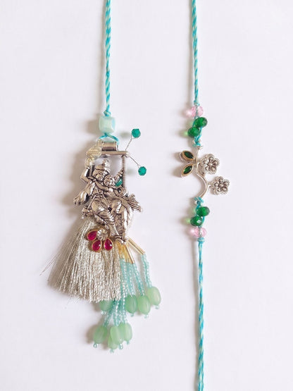 Dhiyona Set Of 2 Designer Religious Silver Toned Bhaiya Bhabhi Rakhi