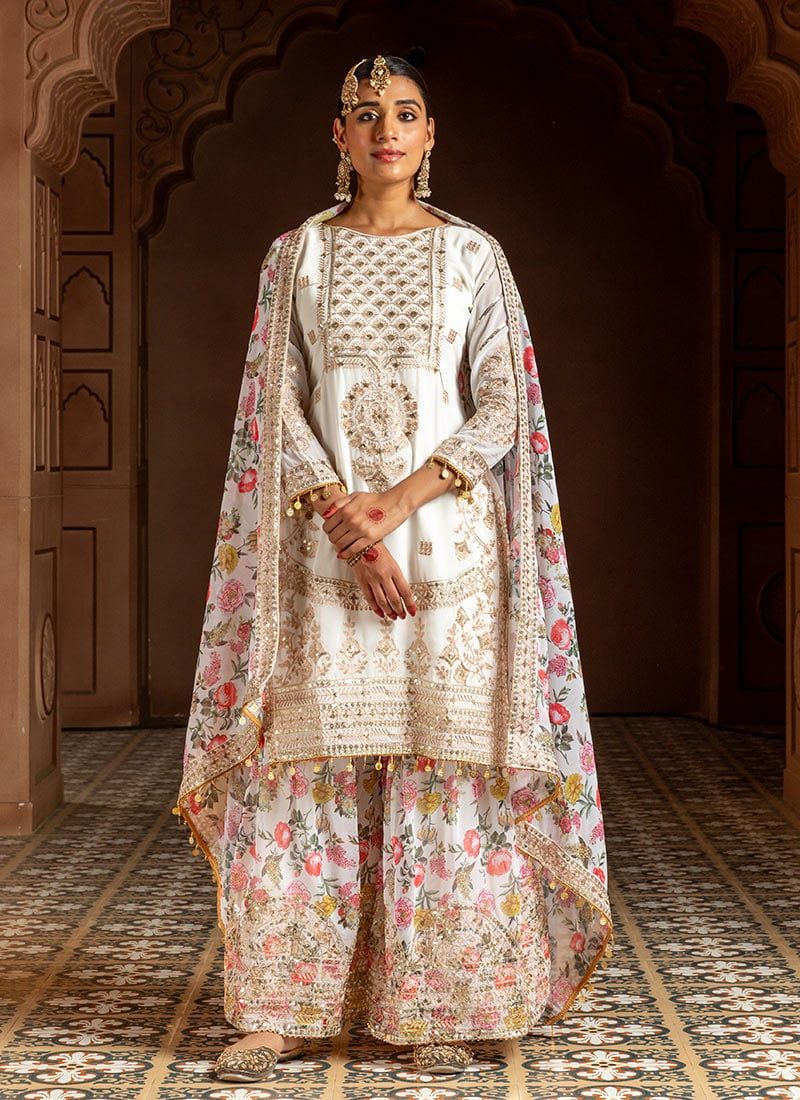Dhiyona KL Women Floral Embroidered Regular Sequinned Kurta with Sharara & With Dupatta