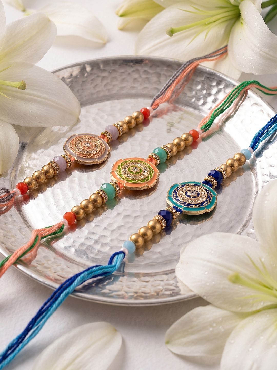 Dhiyona Set Of 3 Floral Design Multicolor Artificial Beads Thread Rakhi With Roli Chawal